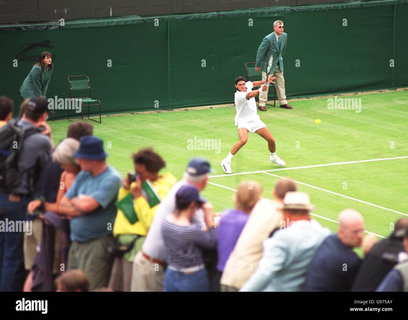 Tennis - campionati di Wimbledon - Uomini Singoli - Primo round - Xavier Malisse v Mark PHILIPPOUSSIS Foto Stock