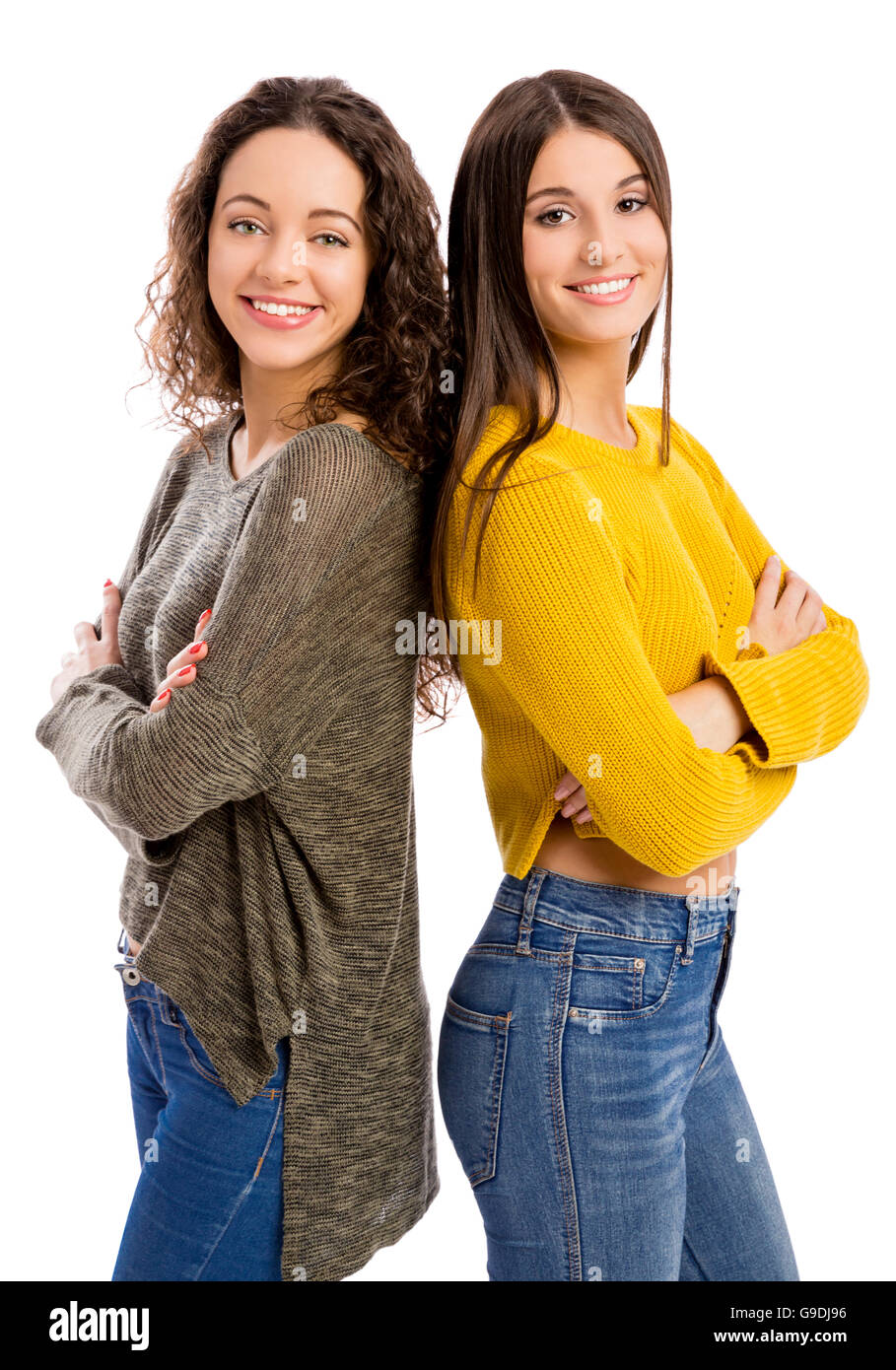 Ritratto in studio di due belle ragazze sorridenti Foto Stock