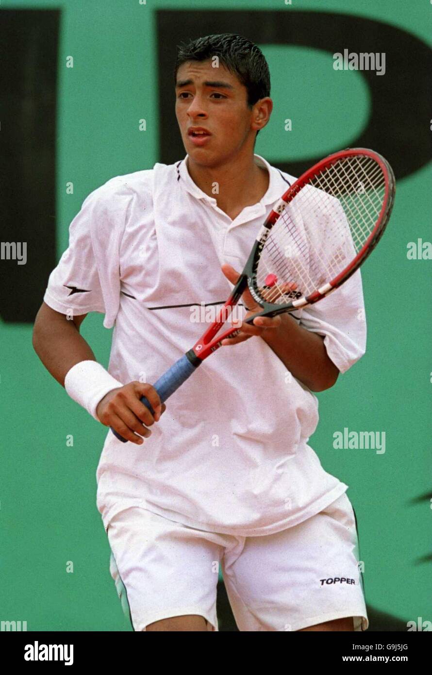 Christian Villagran in azione contro Nicolas Mahut nei ragazzi singoli Foto Stock