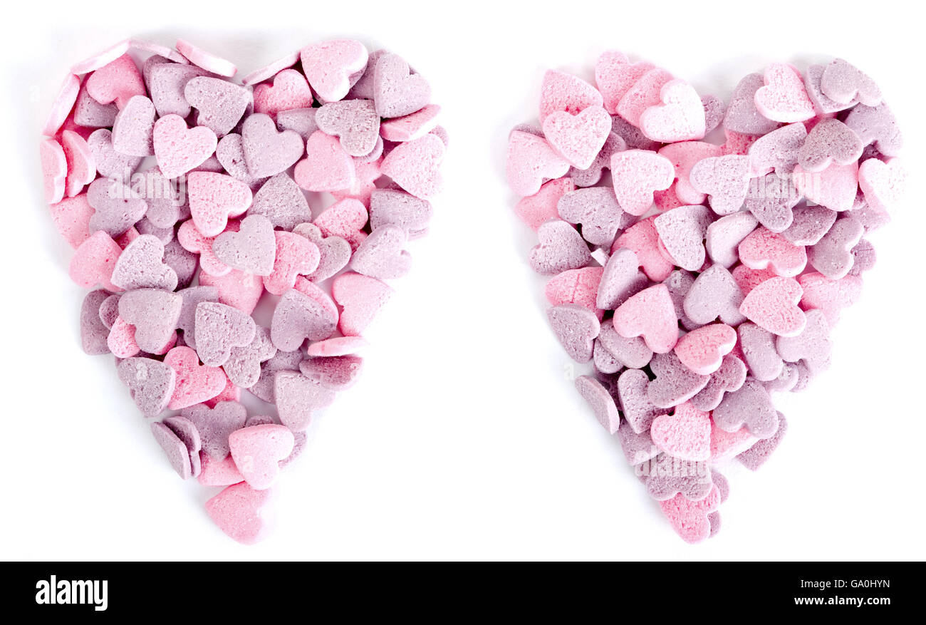 Viola e rosa candy cuori a forma di cuore Foto Stock