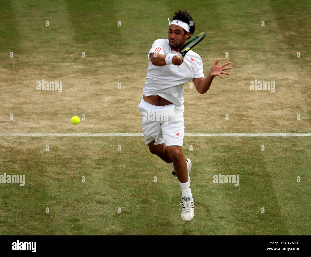 Tennis - Campionati di Wimbledon 2007 - Day Eleven - All England Club. Marcos Baghdatis in azione contro Novak Djokovic Foto Stock