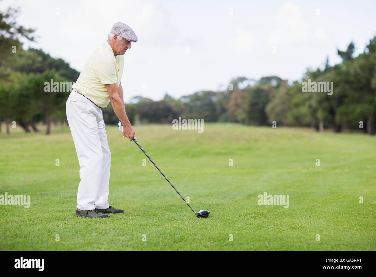 Uomo maturo per giocare a golf Foto Stock