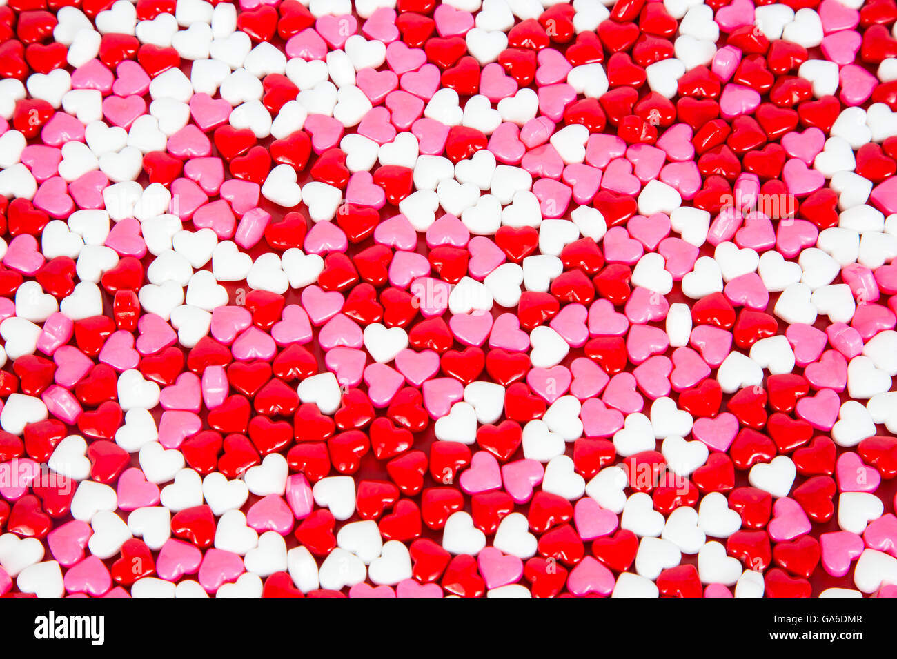 Rosso, bianco e rosa candy cuori per il giorno di San Valentino. Foto Stock