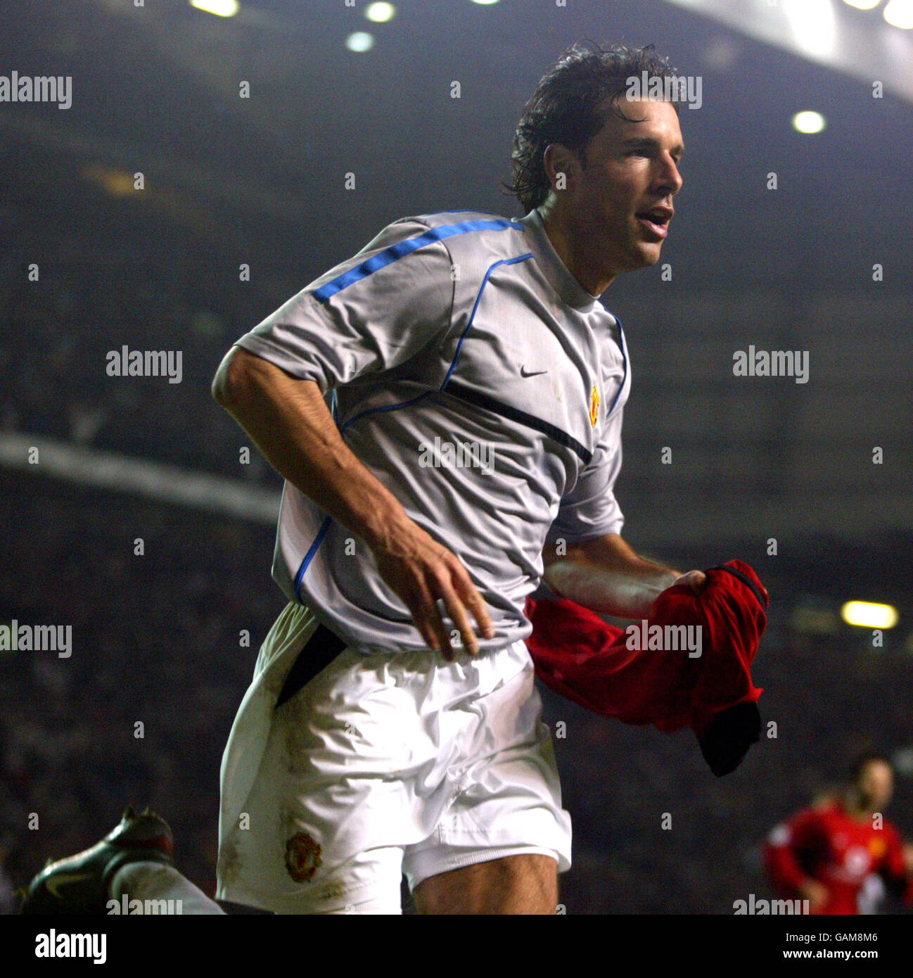 Il Ruud van Nistelrooy di Manchester United celebra il raggiungimento del traguardo vincente Foto Stock