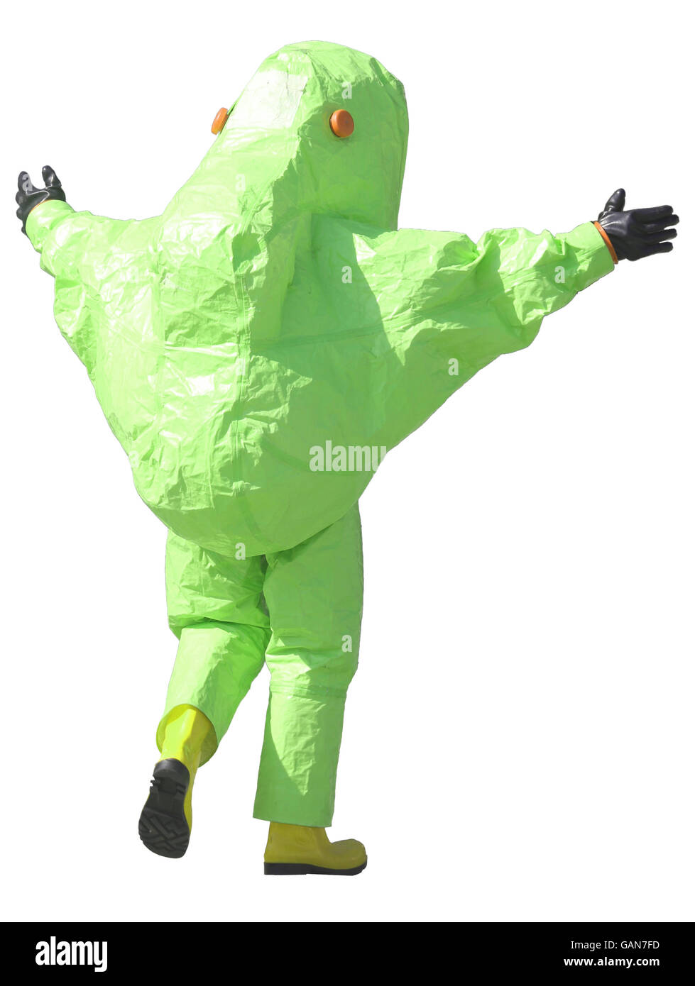 Persona con verde tuta protettiva per gestire i materiali pericolosi Foto Stock