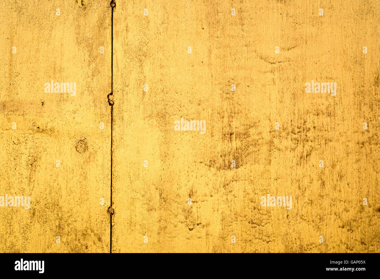 Stile grunge oro a chiazze di legno verniciato con superficie copia area spazio per sovrapposizioni di testo. Foto Stock
