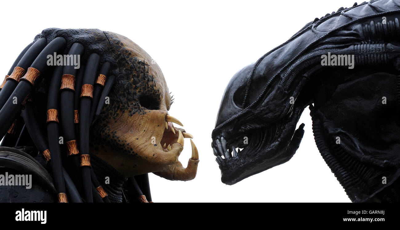Alien e Predator caratteri come turisti - Londra Foto Stock