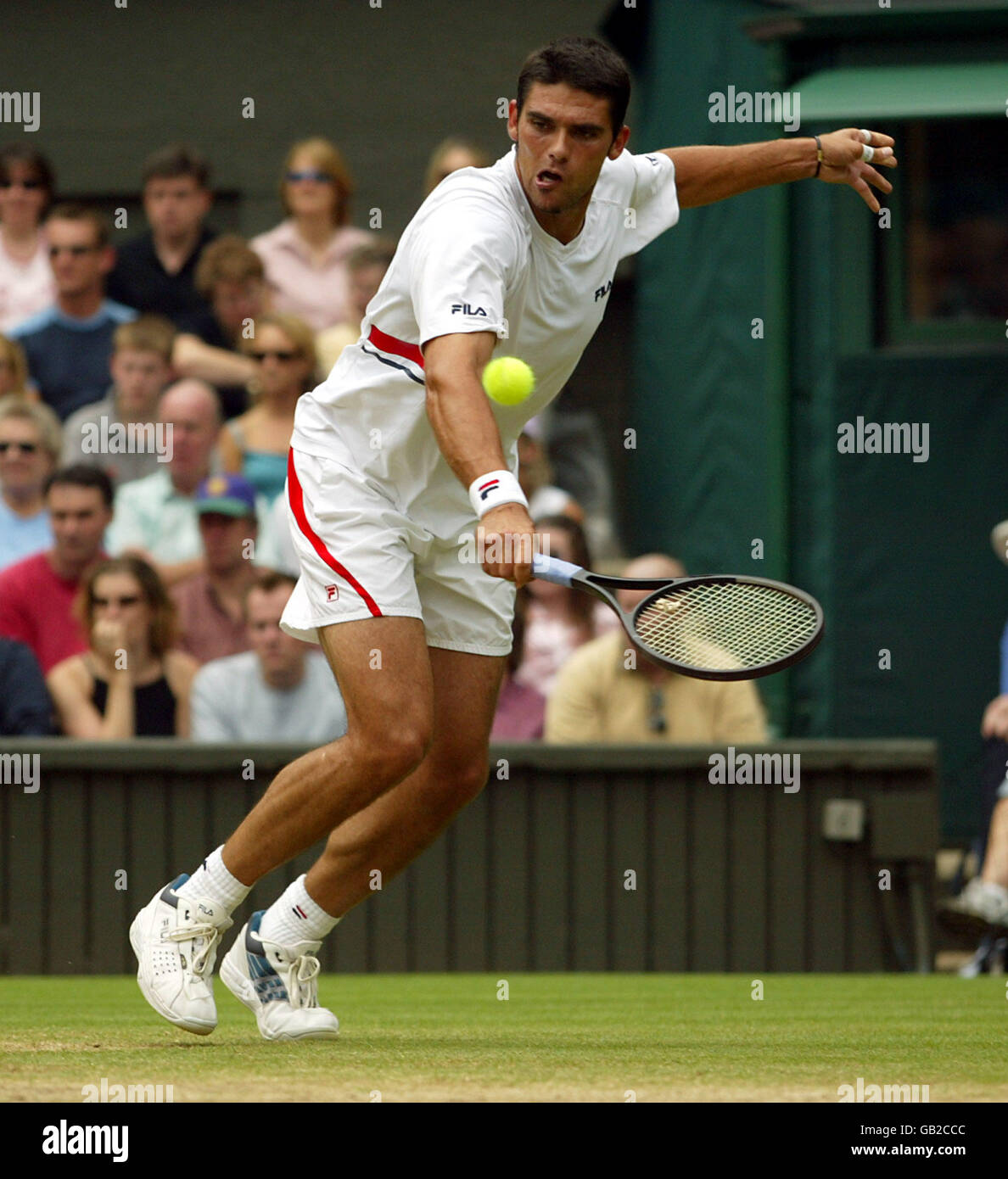 Tennis - Wimbledon 2003 - Semifinale, Sebastien Grosjean contro Mark Philippoussis. Mark Philippoussis torna a Sebastien Grosjean Foto Stock