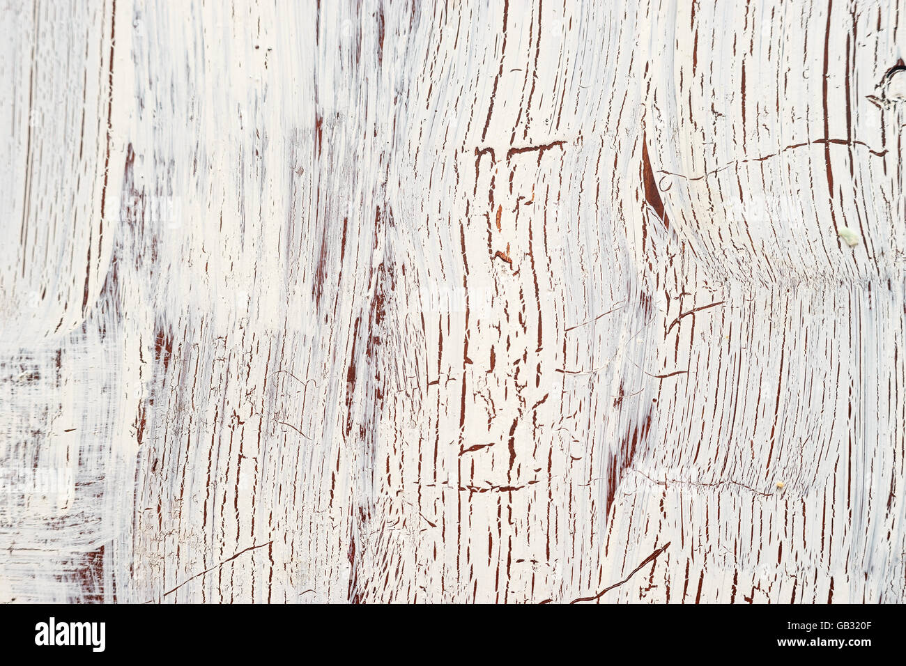 Vecchio shabby superficie in legno con incrinato vernice bianca Foto Stock