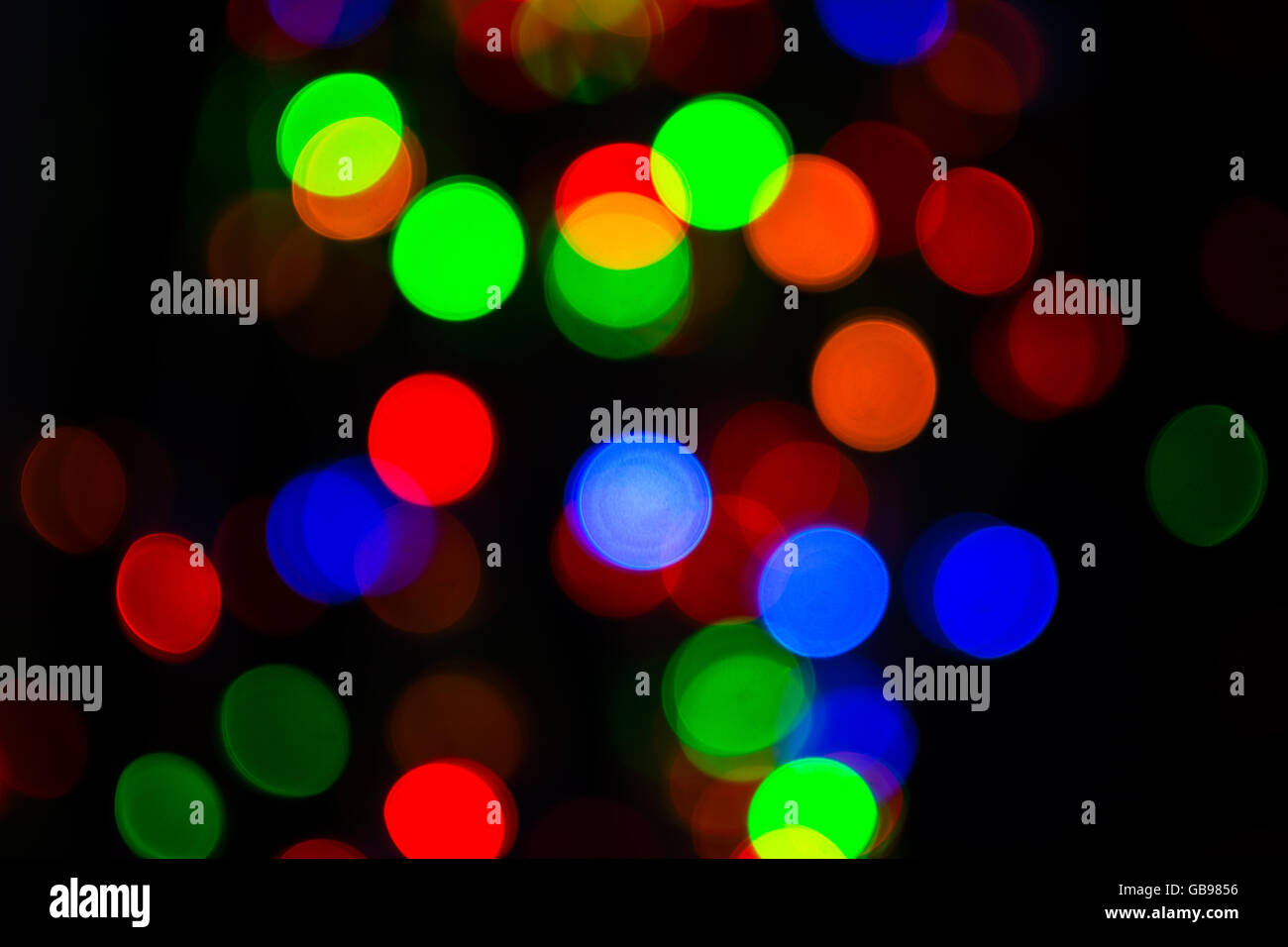 Illuminazione stradale bokeh sfondo. Sfondo di lampadine Foto Stock