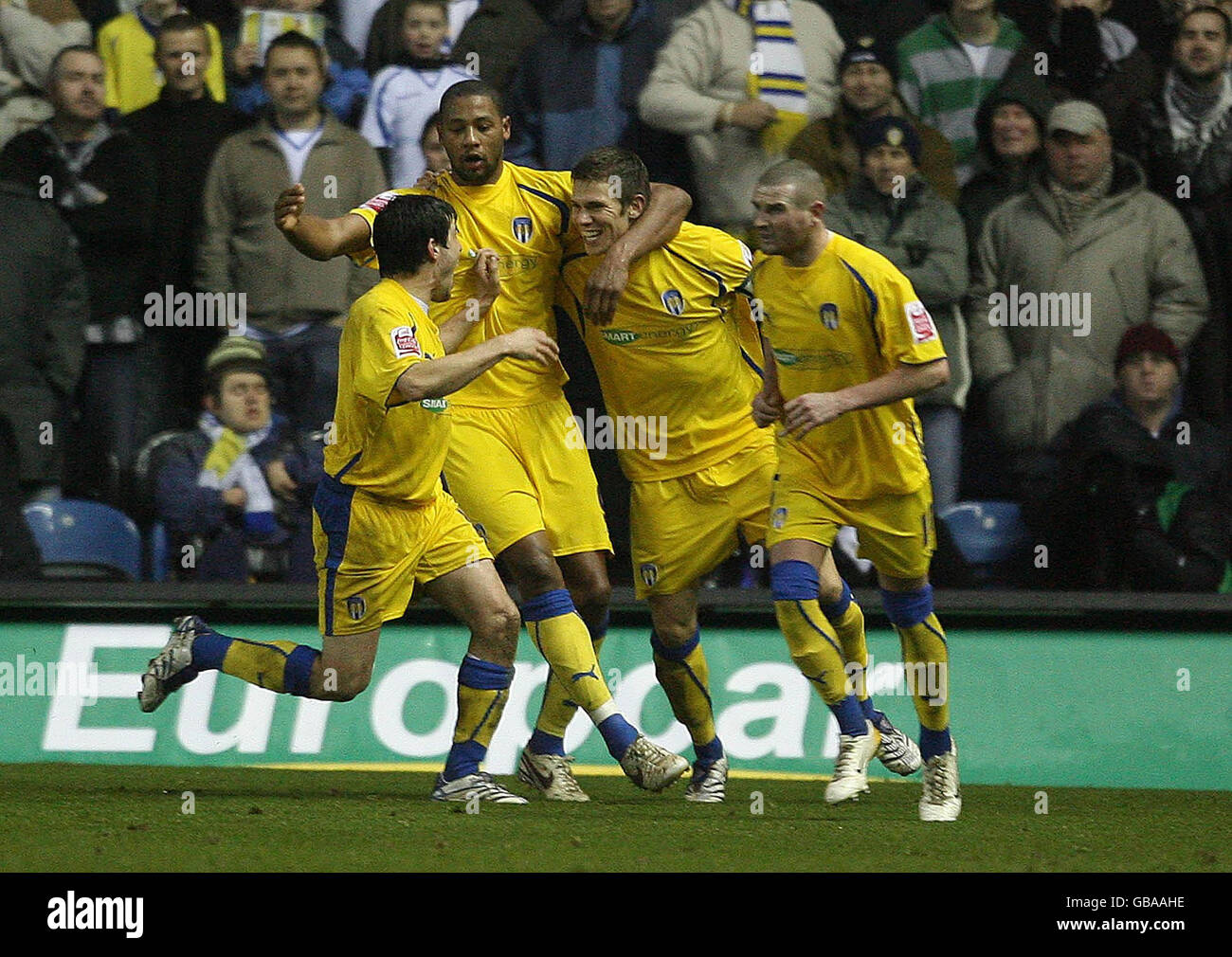 I giocatori di Colchester United festeggiano il loro primo gol durante la partita della Coca-Cola League 1 a Elland Road, Leeds. Foto Stock
