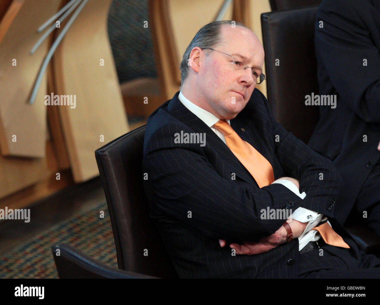 John Swinney, segretario scozzese alle finanze, durante un dibattito sulle finanze locali al parlamento scozzese di Edimburgo. Foto Stock