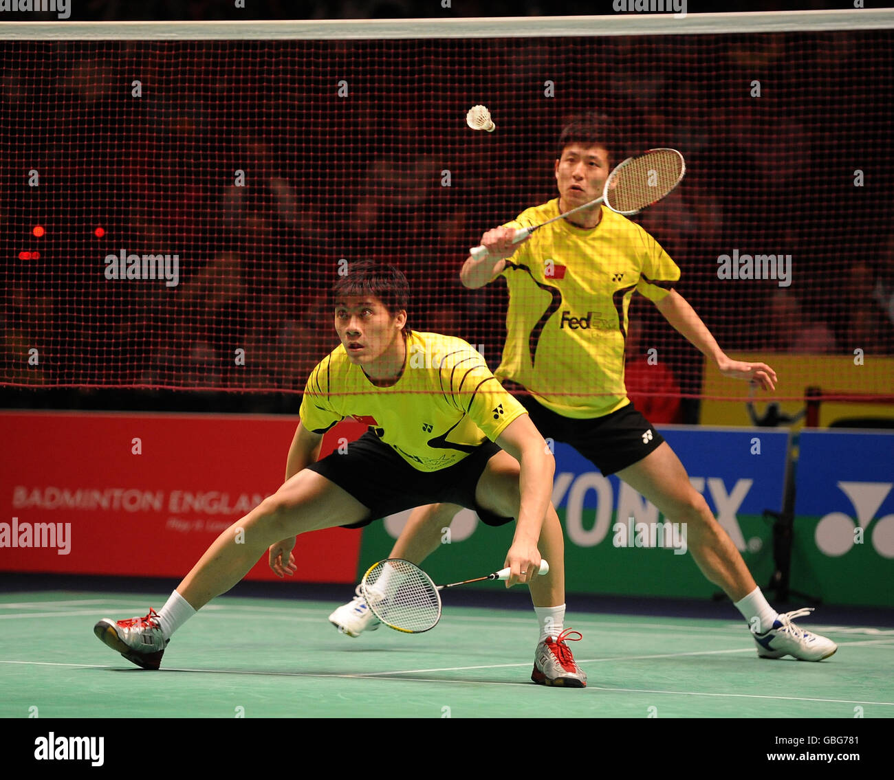 Badminton - Yonex All England Open Championships 2009 - National Indoor Arena. La Cina cai Yun e fu Haifeng in azione nella finale Mens Doubles Foto Stock