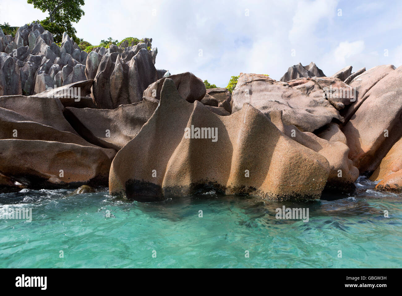 Costa di Granito al tropical St. Pierre isola a Seychelles, Oceano Indiano Foto Stock