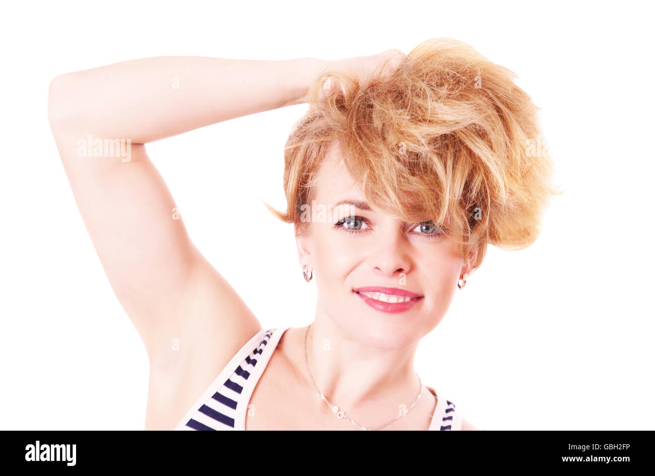 Allegro divertente donna con capelli shaggy, isolato su sfondo bianco Foto Stock