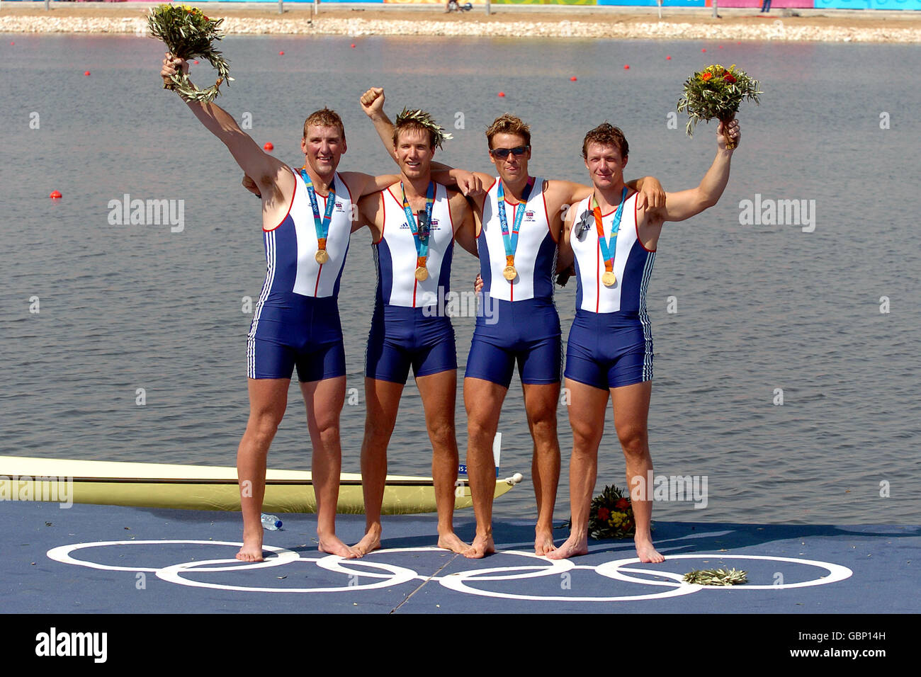 I quattro di Matthew Pinsent, ed Coode, James Cracknell e Steve Williams celebrano con i loro madals d'oro Foto Stock