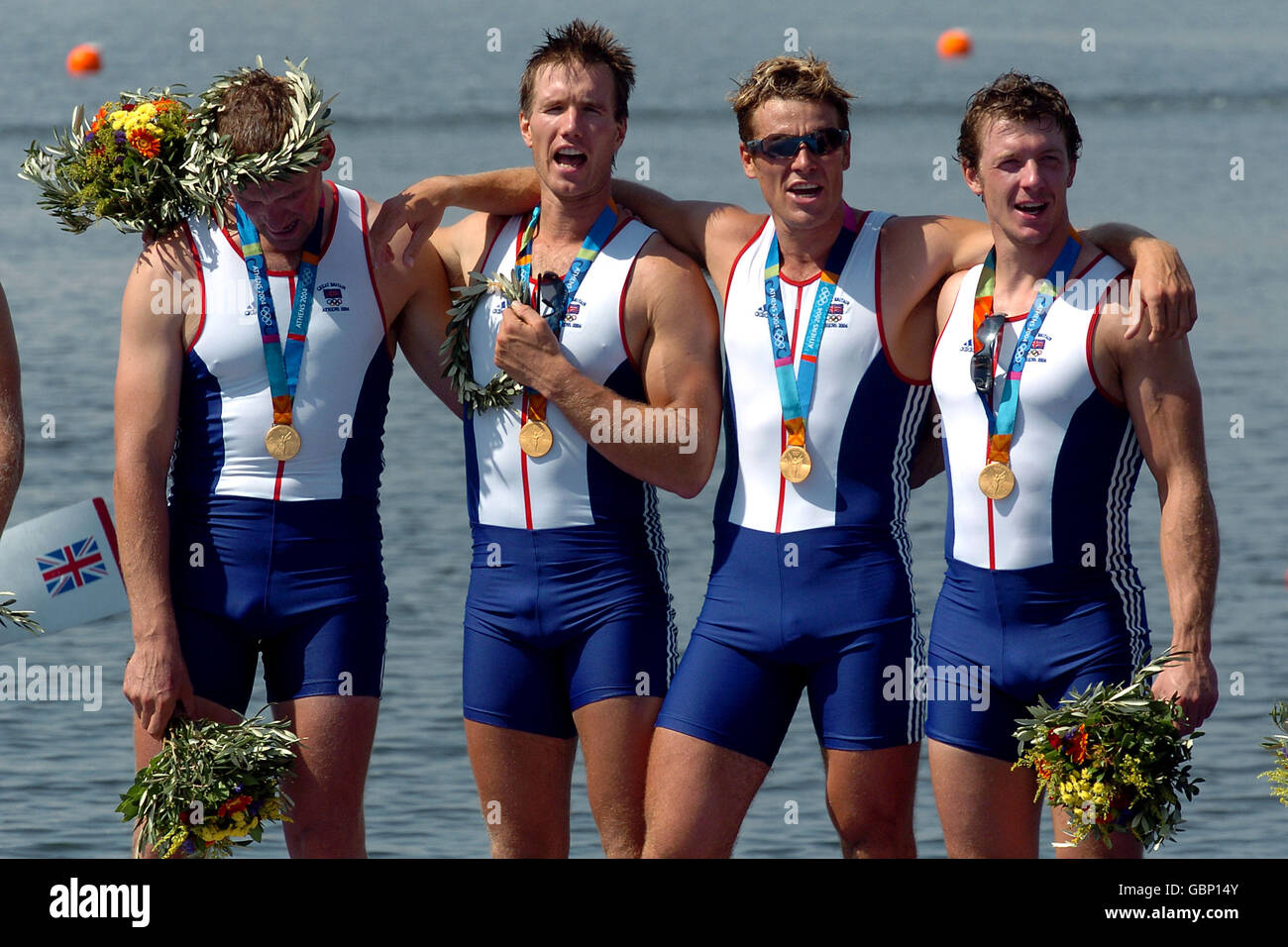 I quattro di Matthew Pinsent, ed Coode, James Cracknell e Steve Williams celebrano con i loro madals d'oro Foto Stock