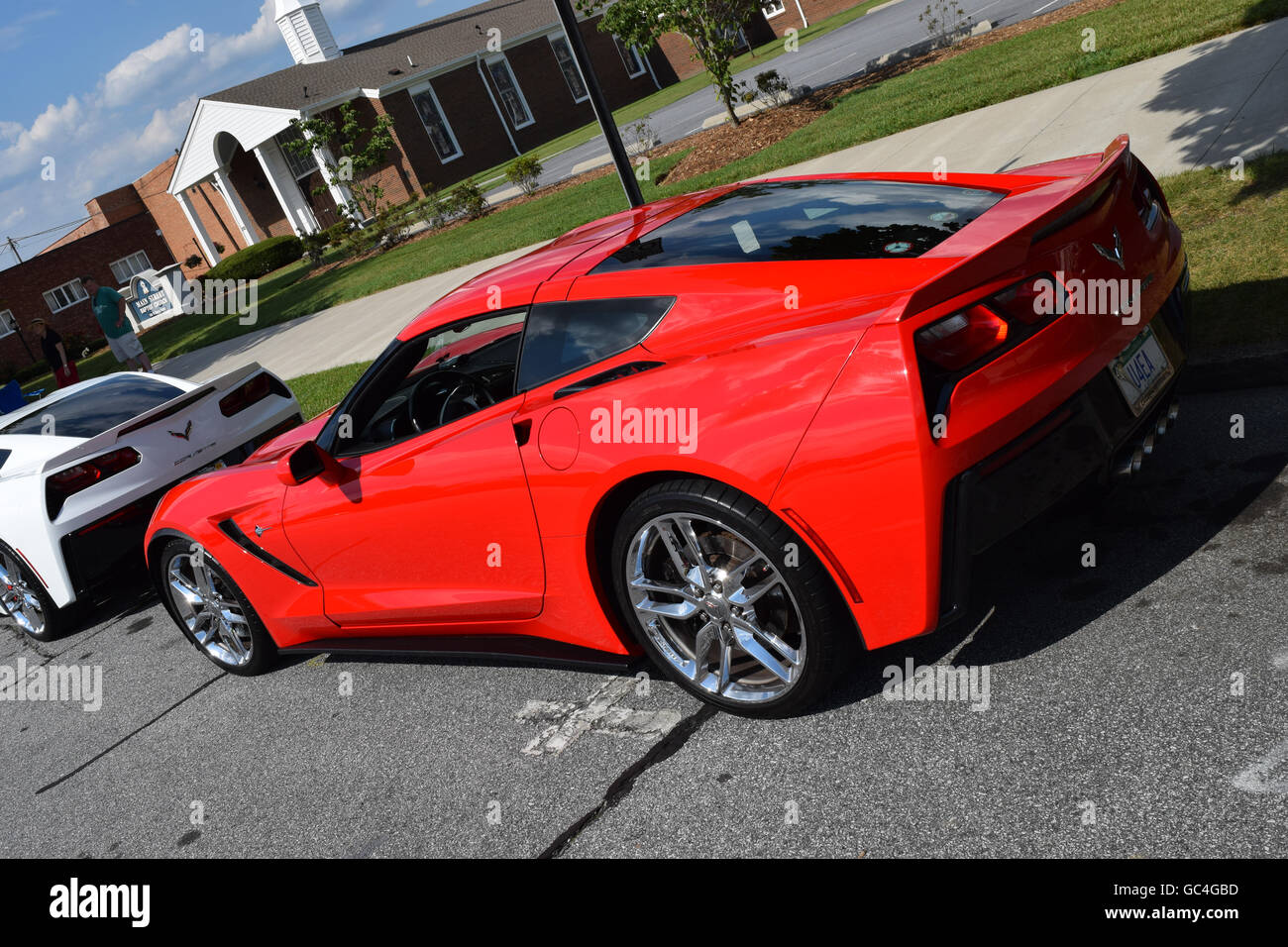 Un rosso Corvette C7 Stingray Coupe ad un Auto Show. Foto Stock