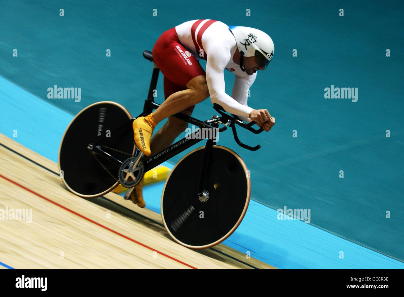 Manchester 2002 - Giochi del Commonwealth - Ciclismo - prova a tempo 1000m per uomini. Jason Queally dell'Inghilterra è sulla sua strada per il secondo posto Foto Stock