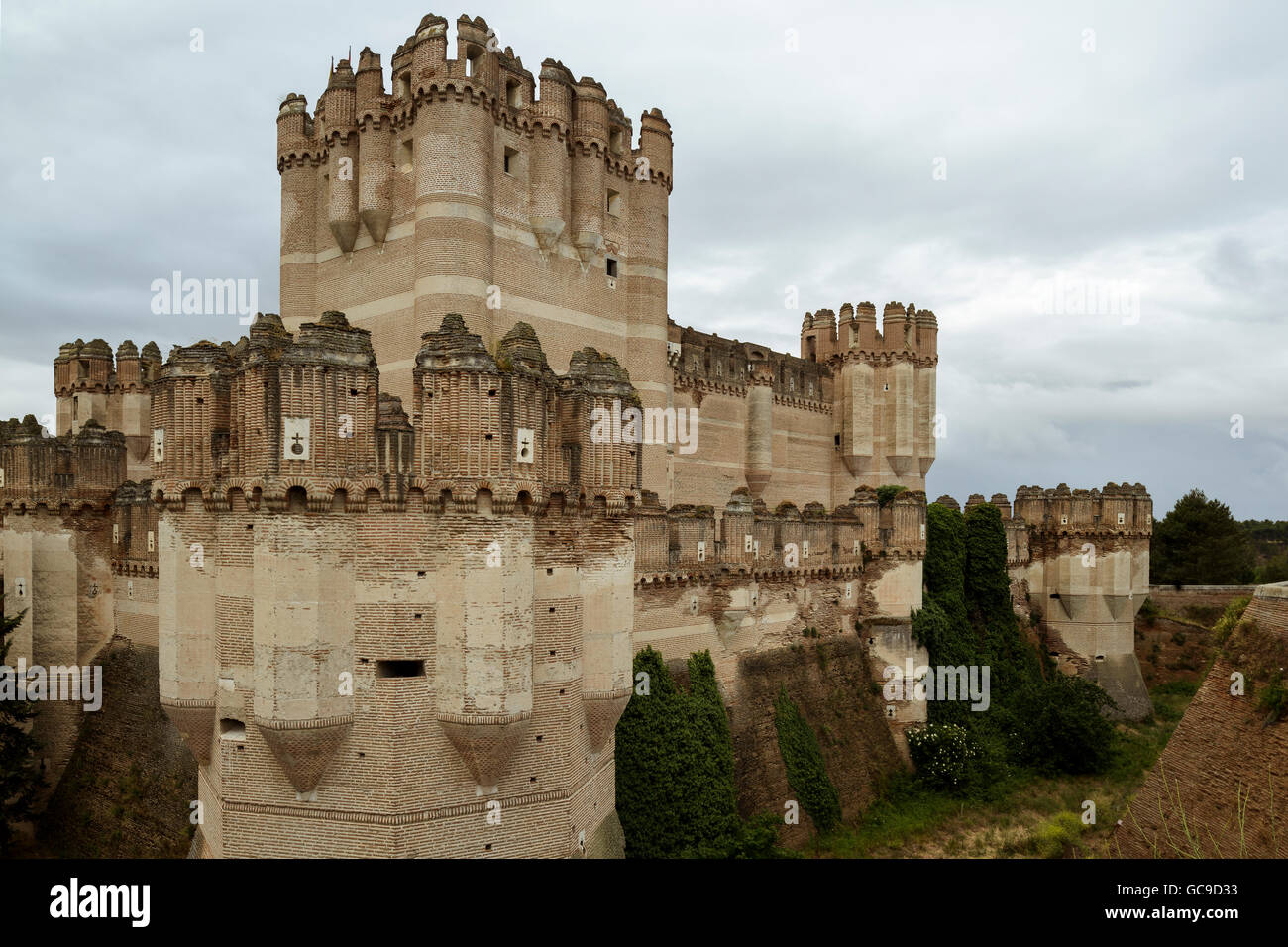 Stile moresco Castello nella città di Coca, Segovia provincia di Castilla y Leon, Spagna Foto Stock