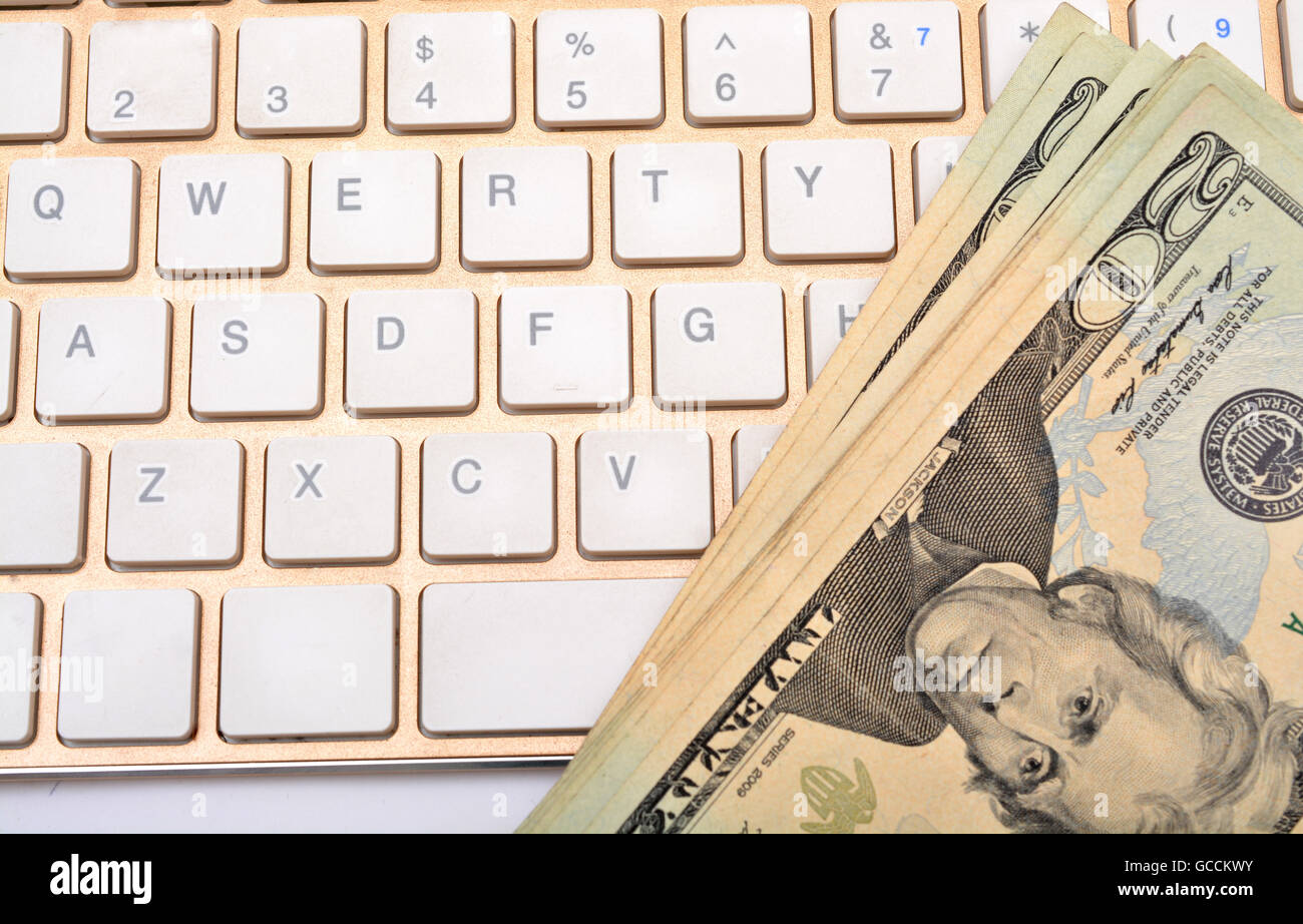 Guadagna Online di dollari sul concetto di tastiera. Foto Stock