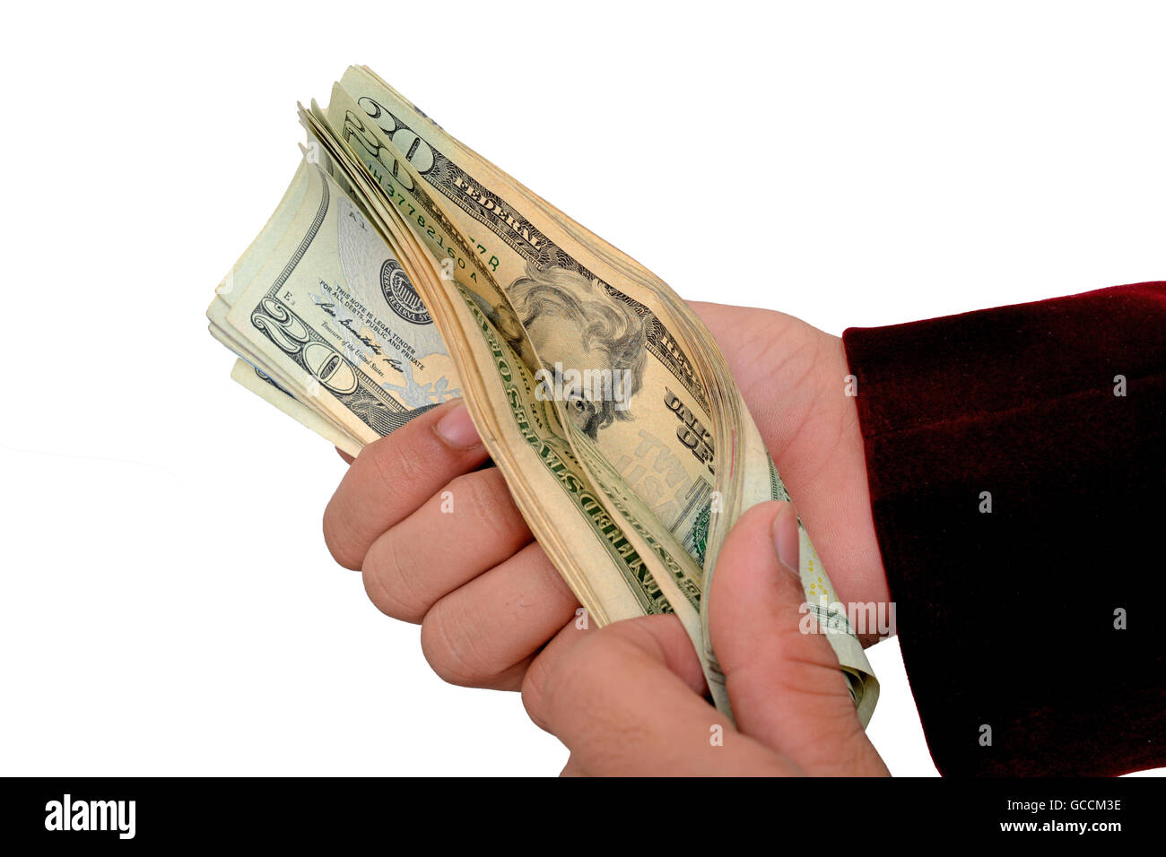 Professional il conteggio della moneta note di dollari in mano. Foto Stock