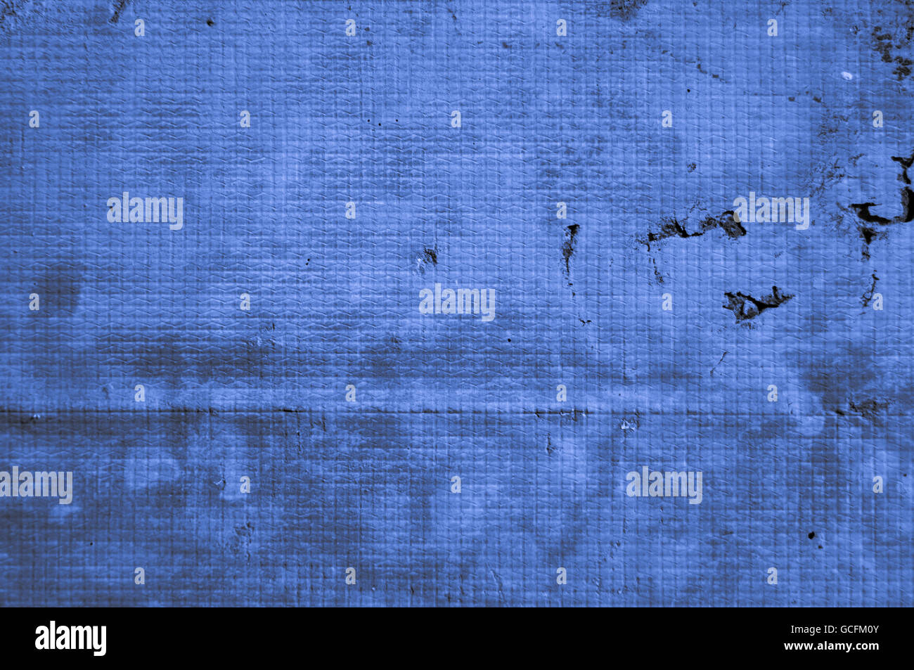 La luce blu grigio bluastro indigo sfondi dai materiali da costruzione con tracce ruvido e la struttura di griglia Foto Stock