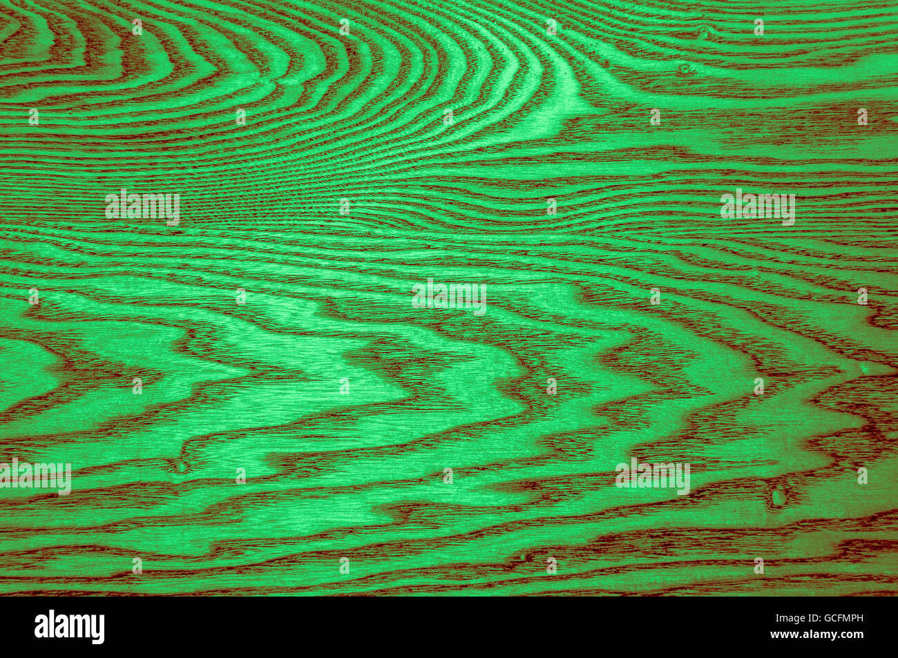 Perfetta luce verde scuro rossiccio legno verdolino texture dispiegamento di sfondo per tutto lo schermo Foto Stock