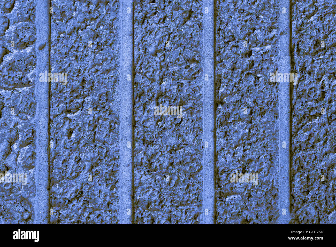 Blu perfetto bruno giallastro indigo ad alta risoluzione urbano naturale muro di mattoni sfondo con strisce verticali struttura Foto Stock
