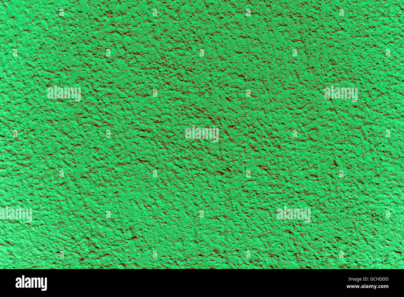Ottima la luce verde scuro di colore verdastro rossastra parete di pietra backgrounds - con intonaco strutturato Foto Stock