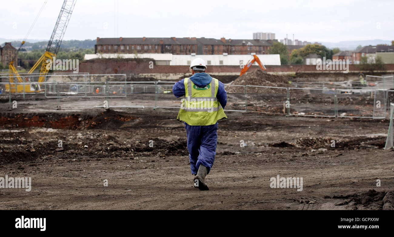 Vista generale dei lavori di risanamento iniziali per il quartiere residenziale e il Commonwealth Games Village a Glasgow. Foto Stock