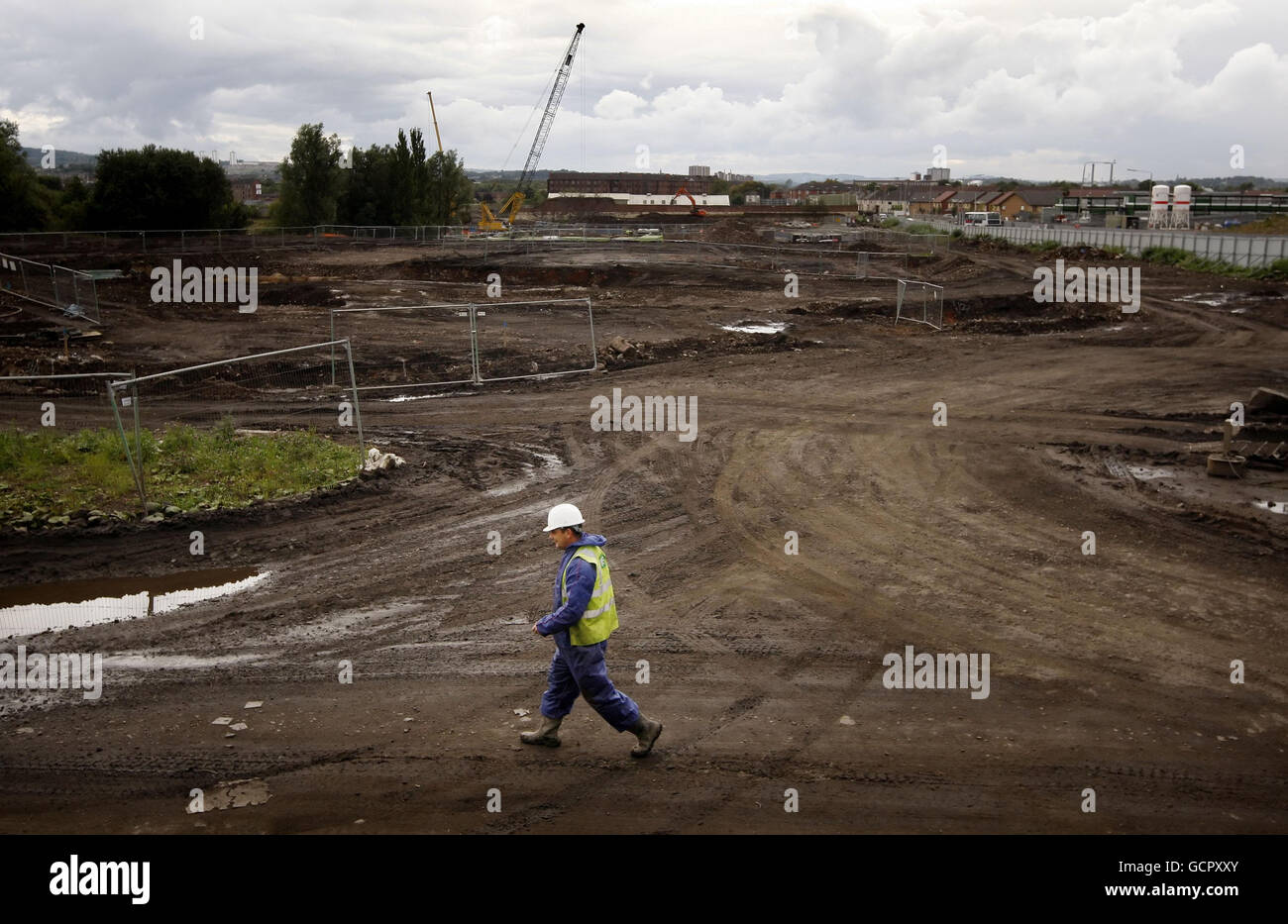 Vista generale dei lavori di risanamento iniziali per il quartiere residenziale e il Commonwealth Games Village a Glasgow. Foto Stock