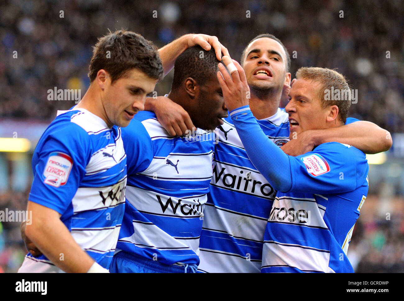 Calcio - Npower Football League Championship - Burnley v Reading - Turf Moor. Reading's Shane Long, Hal Robson - Kanu e Brian Howard si congratulano con Michail Antonio (seconda a sinistra) per aver segnato il loro terzo obiettivo Foto Stock