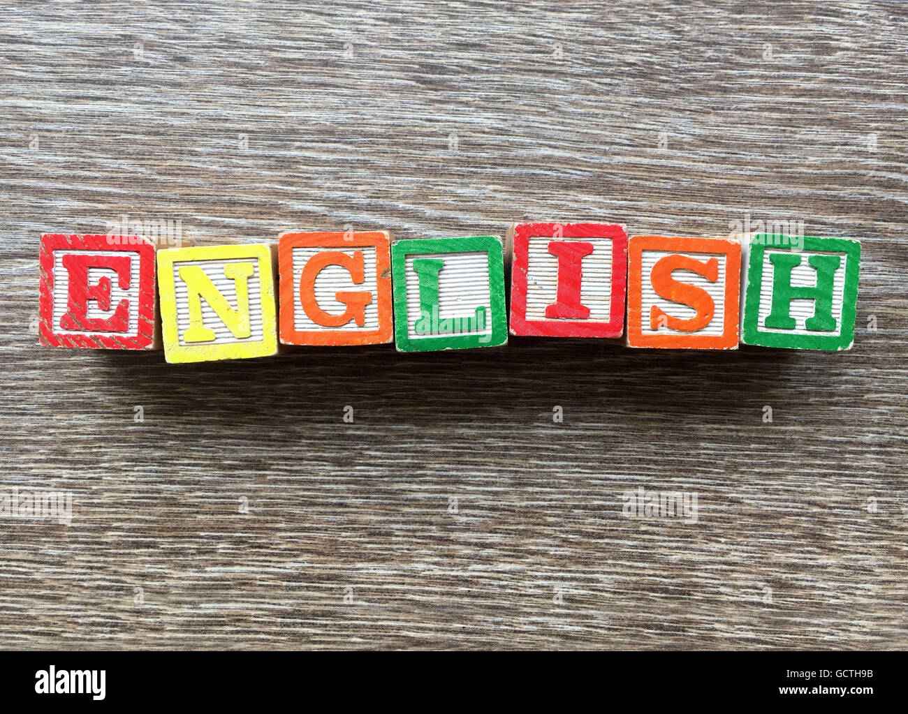 Parola inglese fatto con alfabeto blocchetti di legno lettere Foto Stock