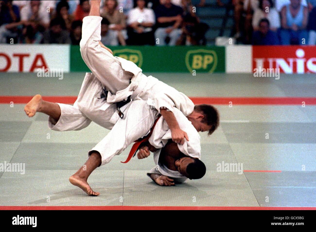 GIOCHI DI COMMONWEALTH. DENSIGN BIANCO ORO IN JUDO Foto Stock