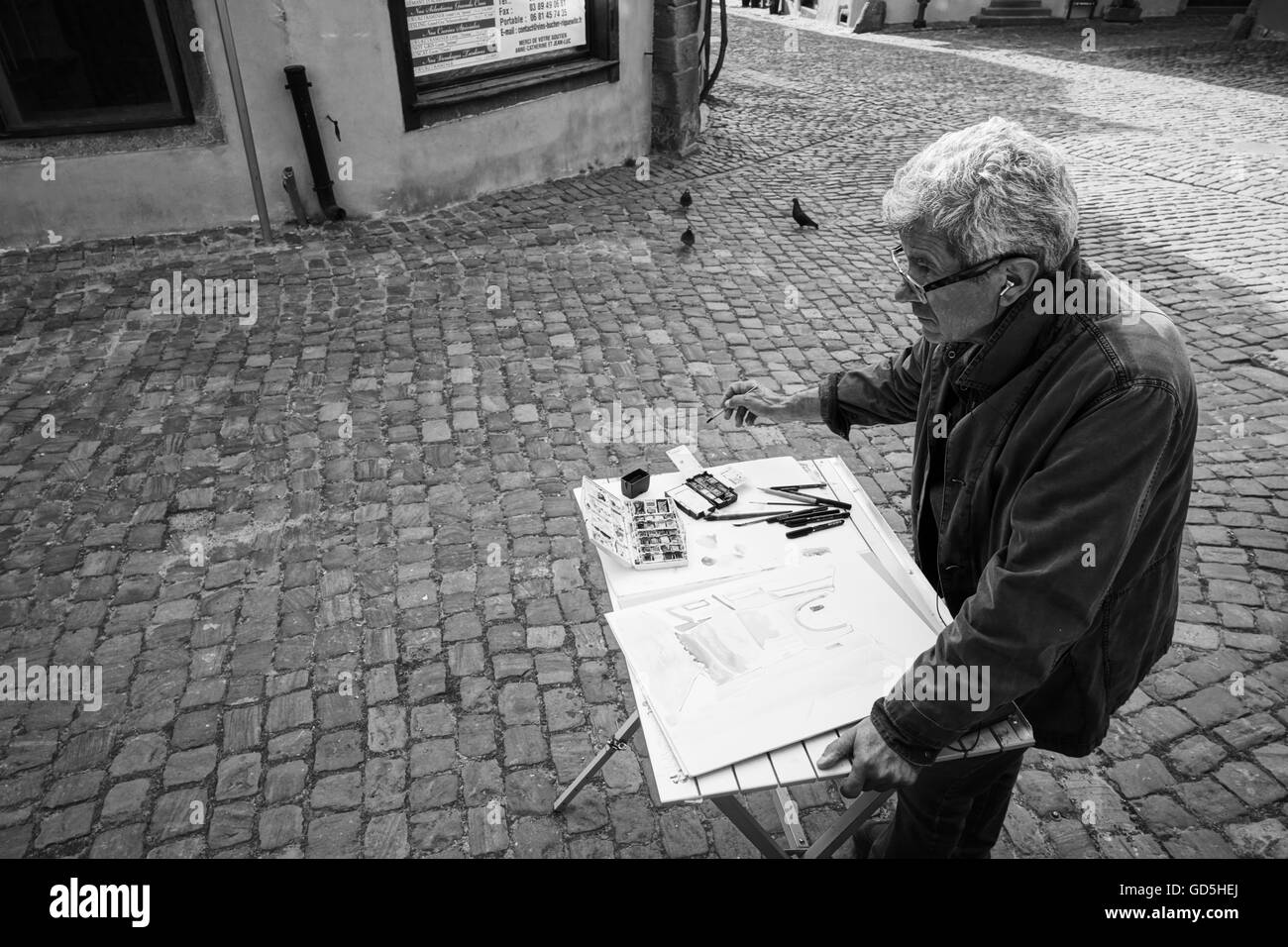 Pittore artista strada di ciottoli, riquewihr Colmar, Francia, Europa Foto Stock