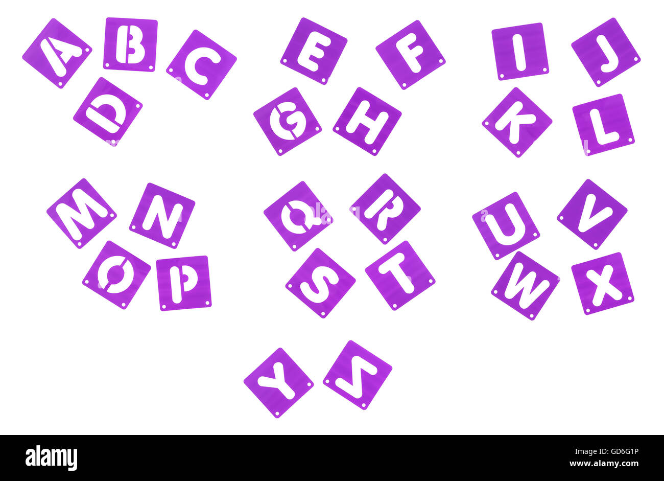 L'alfabeto completo di porpora poster board stampini su uno sfondo bianco. Foto Stock