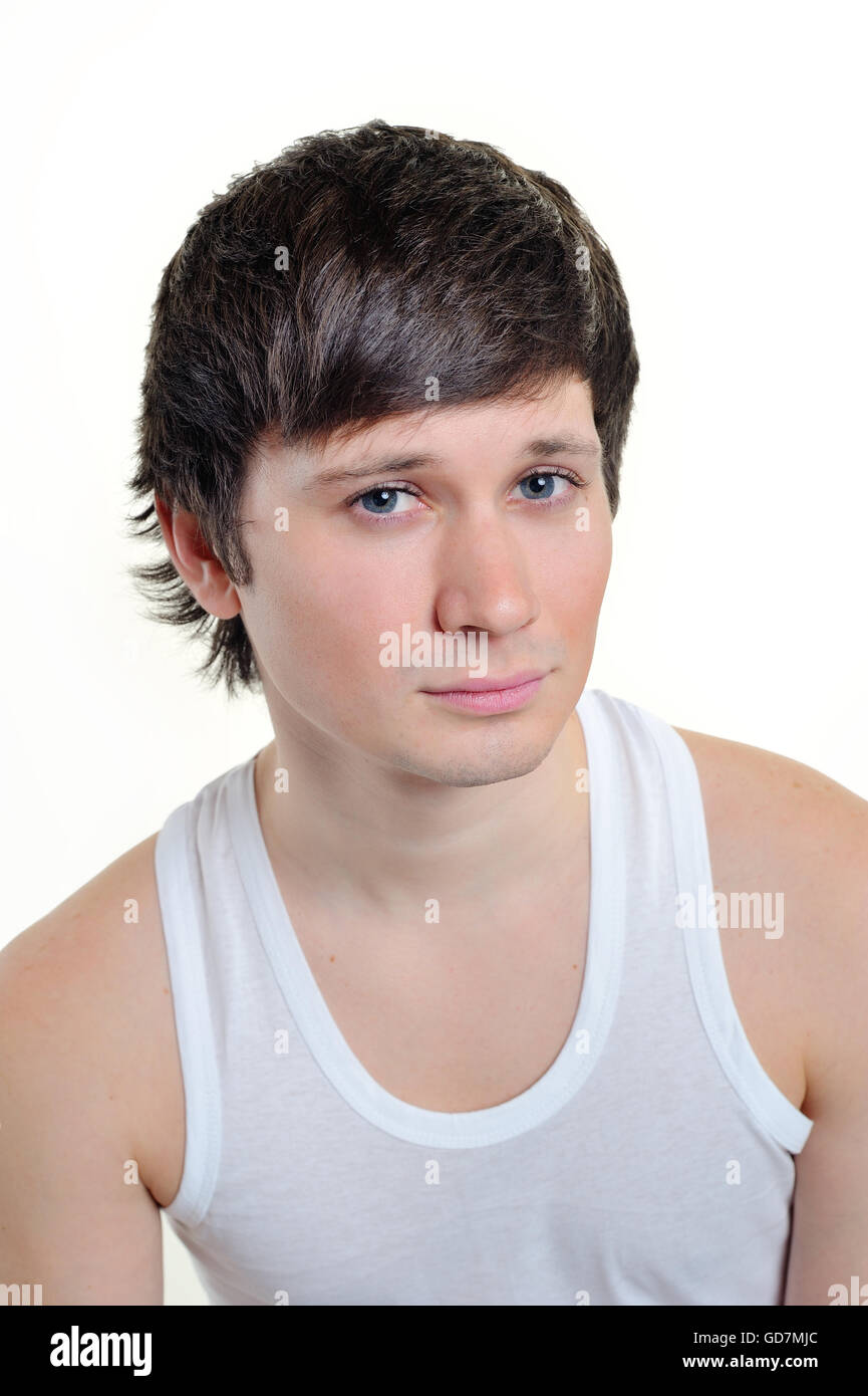 Ritratto di un uomo su uno sfondo bianco in studio Foto Stock