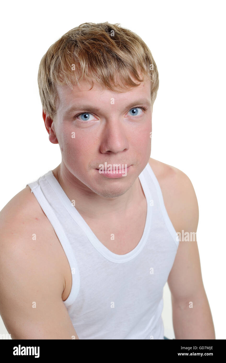 Ritratto di un uomo su uno sfondo bianco in studio Foto Stock