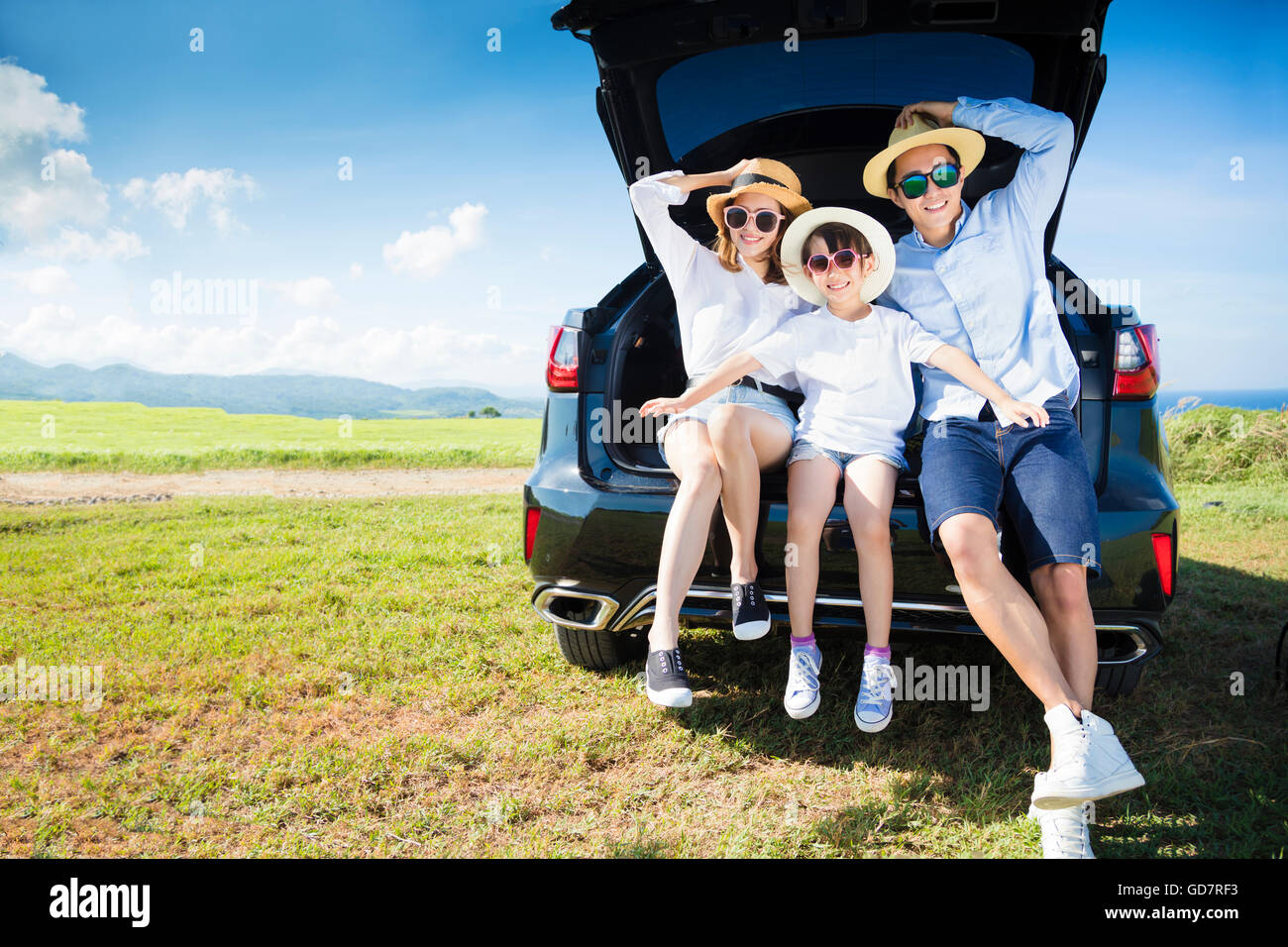 La famiglia felice godendo di viaggio e la vacanza estiva Foto Stock
