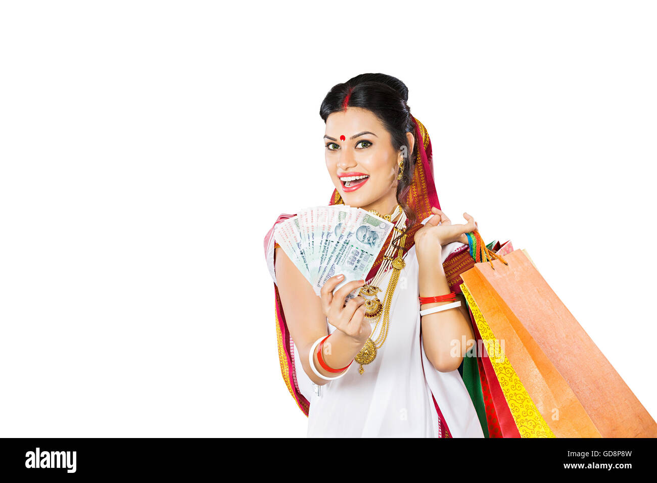 1 Indian Bengali donna adulta Holding Shopping bag il denaro che mostra Foto Stock