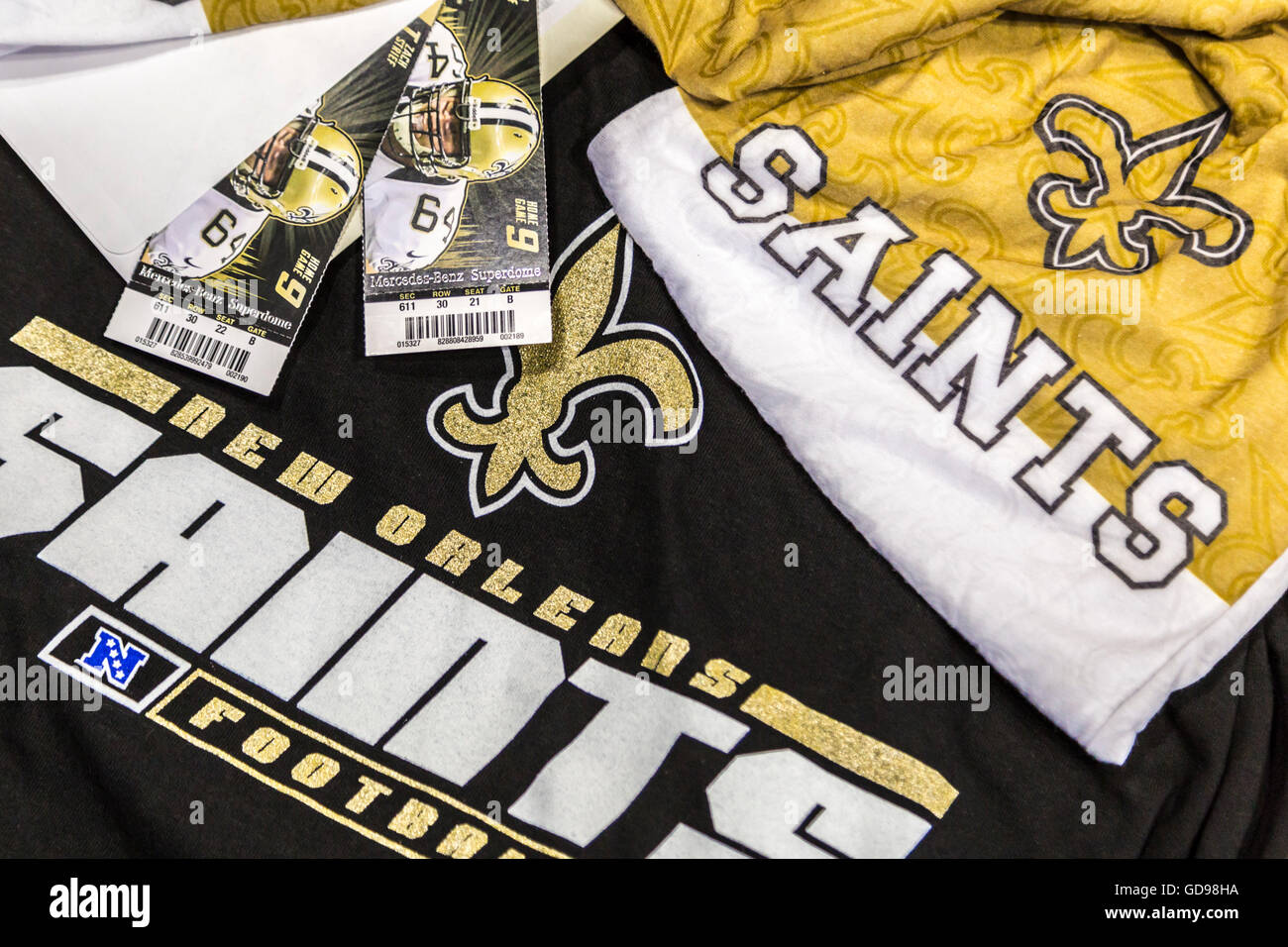 Biglietti, magliette e loghi per New Orleans Saints squadra di football americano Foto Stock