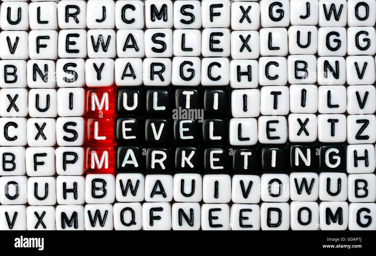 A cubetti con testo MLM ,Multi Level Marketing Foto Stock