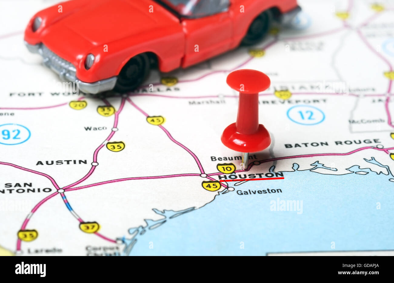 Close up di Houston USA mappa con perno rosso e auto sportive - Concetto di viaggio Foto Stock