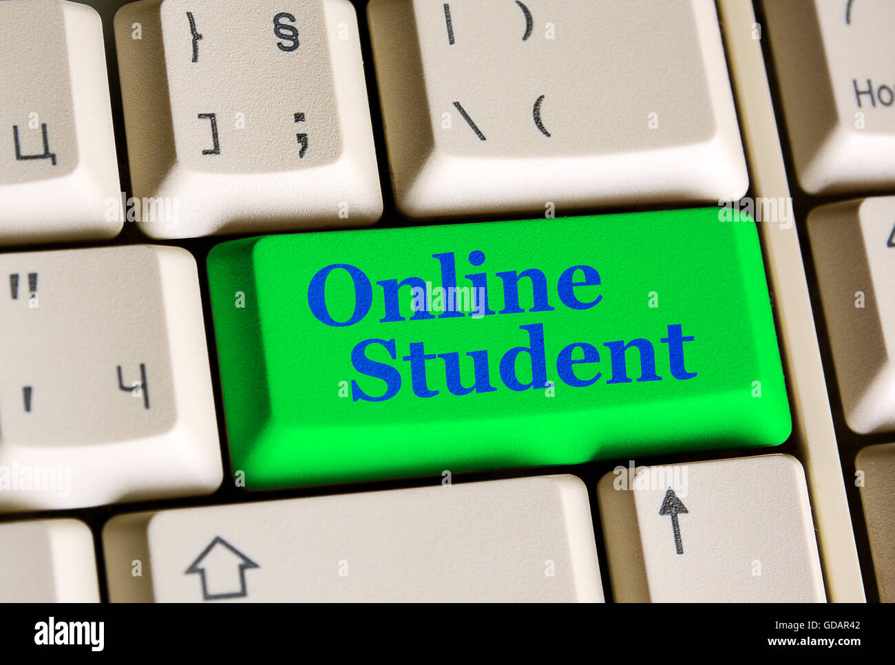 Il concetto di istruzione studente online su verde pulsante tastiera. Foto Stock