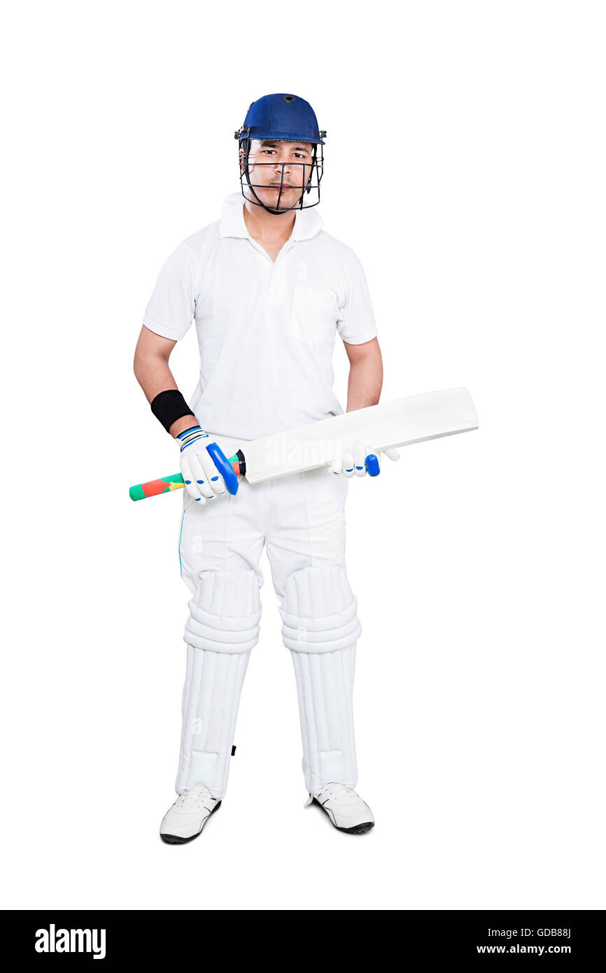 1 indian giovane uomo sport giocatore giocare a cricket e azienda bat Foto Stock