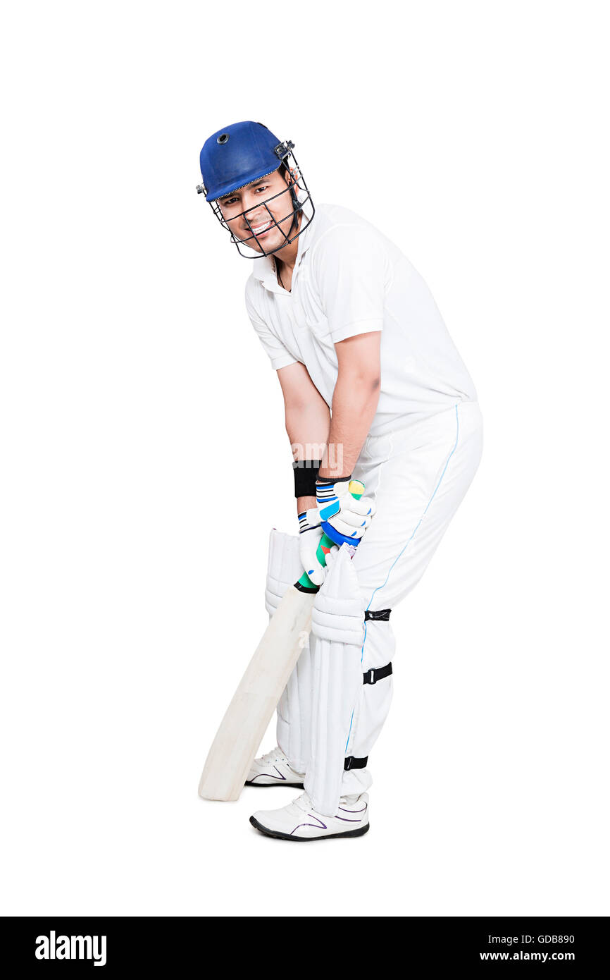 Un indiano giovane cricketer giocando azienda bat cricket gioco di sport Foto Stock