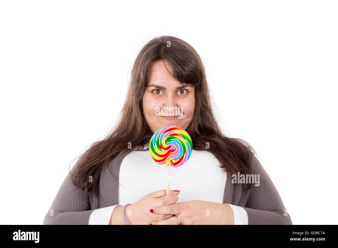 Donna di grande azienda lollipop su sfondo bianco. Foto Stock