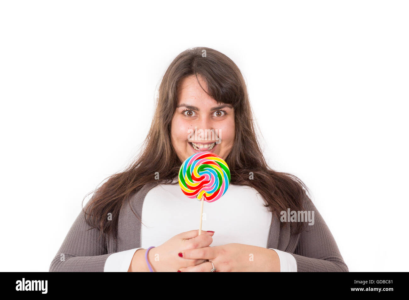 Donna di grande azienda lollipop su sfondo bianco. Foto Stock
