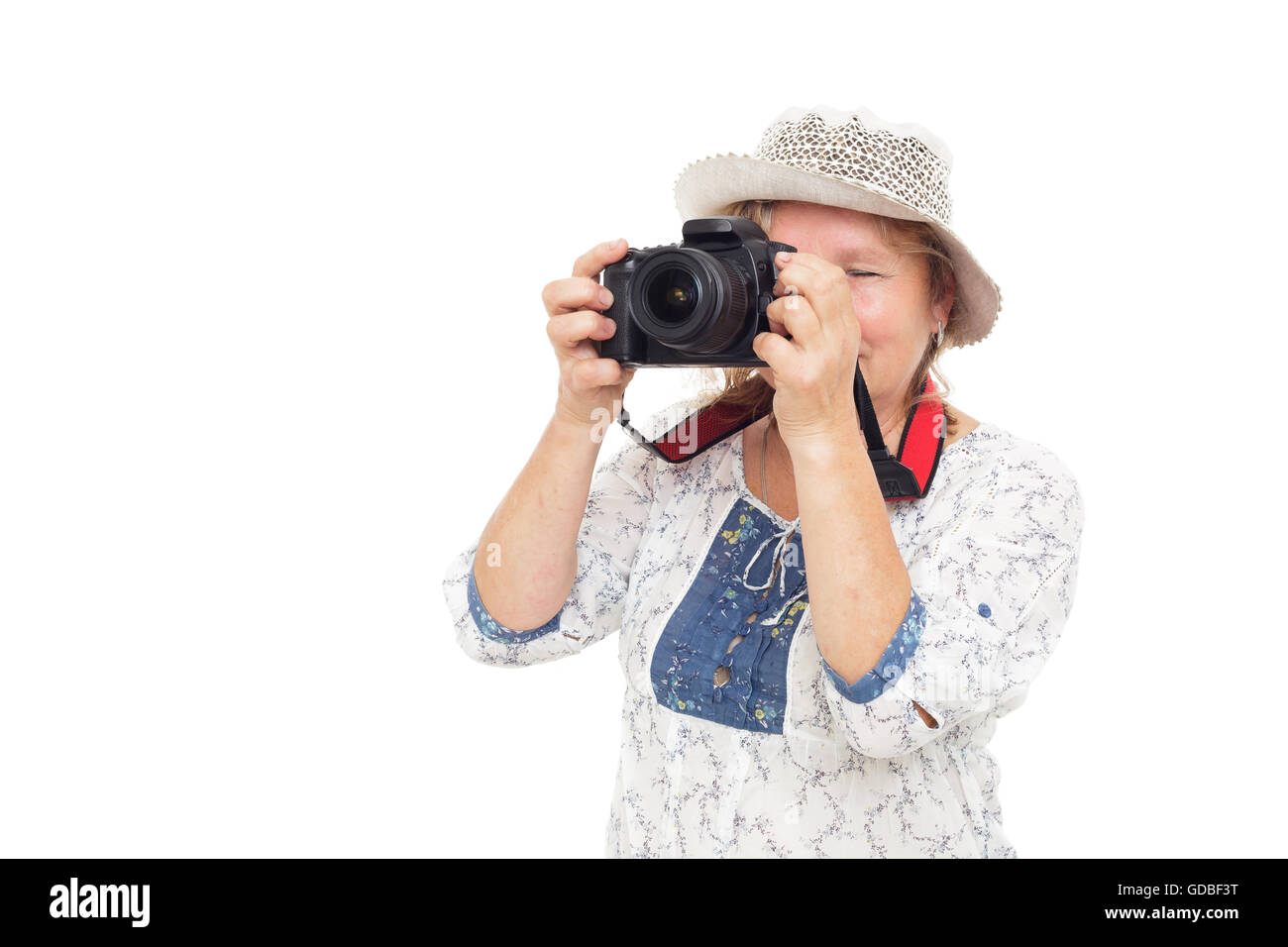 La donna impara a contenere fotocamera e comprensione delle impostazioni Foto Stock